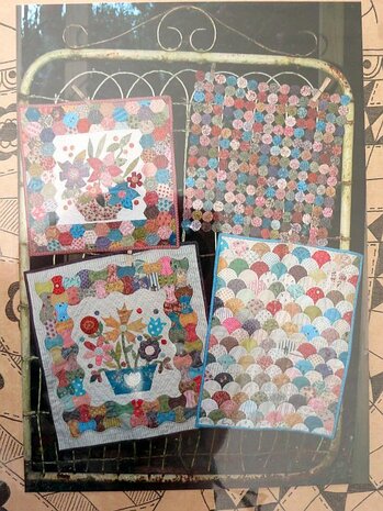 Quiltpatroon - Cherry's hall - 4 mini quilts. Hexagon quilt ong. 40 x 40 cm De Yoyo  quilt is ong. 42 cm x 42 cm. De Apple Core quilt is ong. 47 cm x  52 cm. De Clamshells quilt is ong. 40 x 52 cm.
