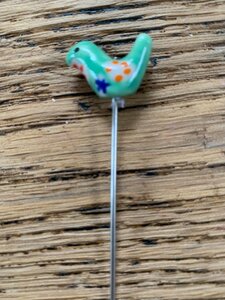 Counting pin vogel  van porselein